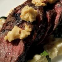 Hanger Steak · pea tendrils, potato puree, anchovy butter