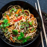 The Original Sizzling Pad Thai · Rice noodles stir-fried with chicken, carrots, onions, scallions, bean sprouts and crushed p...