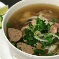 Large Beef Combo Pho With Oxtail · Large special combination with rare steak, well done flank, brisket, tendon, tripe, beef mea...
