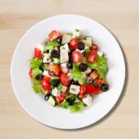 Garden Greek Salad · Prepared with fresh romaine lettuce, tomatoes, Spanish onions, cucumbers, feta cheese, kalam...