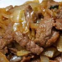 Mongolia Beef / 蒙古牛肉 · Beef slices stir fried with onions.