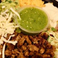 Asada Bowl · Includes your choice of meat pinto or black beans, rice, and pico de gallo with cabbage