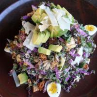Kale Caesar Salad · seasonal kale, hard boiled eggs, Parmesan, avocado, Caesar dressing and croutons.