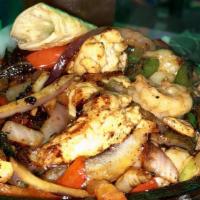 Fajitas Mixtas / Mixed Fajitas. Shrimp, Chicken And Steak · 
