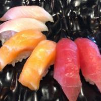 Nigiri · Raw. Fish on rice. Served with choice of rice and protein.