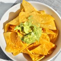 Guacamole W/ Chips · Freshly made to order with ripe avocados, onions, tomatoes and cilantro.