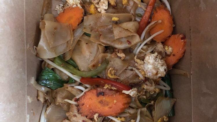 Drunken Noodles · Flat rice noodles, green beans, onions, bell peppers, carrots, cage-free eggs, Cosmo bean sprouts and basil sautéed in our chili garlic sauce.