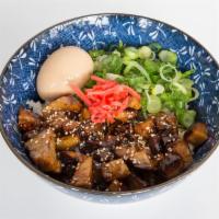 Pork Chashu Bowl · Marinated Pork Chashu over white rice. Topped with green onion, ginger, soft boiled egg, ses...