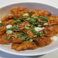 Sweet Chili Chicken Rice Bowl · Chicken in sweet chili sauce. Topped with green onions and sesame seeds