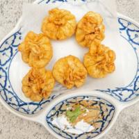Shrimp Rangoon · Shrimp mixed with cream cheese, black pepper and scallion then deep-fried in a crispy wonton...