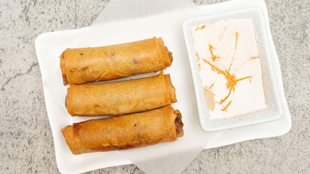 Fried Spring Roll · Por pia tord. Spring roll stuffed with ground pork, bean thread, and assorted vegetable then deep-fried. Served with sweet and sour sauce.