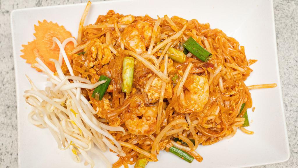 Pad Thai · Stir fried thai noodle with shrimp, chicken, egg, ground peanut, bean sprout and scallion.