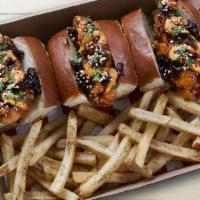 Whiskey-Glazed Bird Dogs · 3 Chicken fingers tossed in Whiskey-Glaze on mini buns with spicy aioli and sesame seasoning...