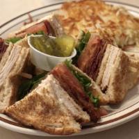 Clubhouse Sandwich · Your choice of bread with turkey breast, bacon, lettuce, tomatoes and mayo.