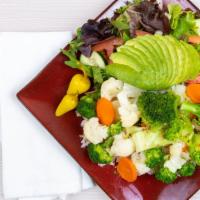 Veggie Plate · Delicius combination of veggies over whole grain brown steam rice ,green salad, avocado , on...
