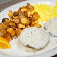Southern Breakfast · Fresh buttermilk biscuit and sausage patty with our delicious country gravy. Served with thr...