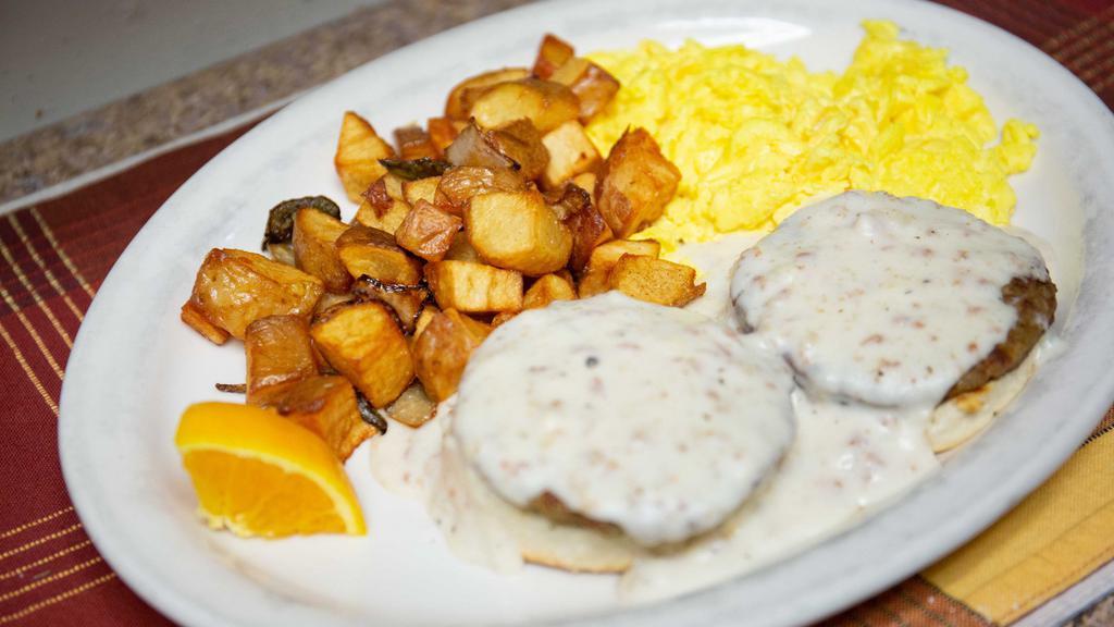Southern Breakfast · Fresh buttermilk biscuit and sausage patty with our delicious country gravy. Served with three large eggs, any style.