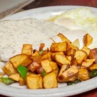 Chicken Fried Steak & Eggs · Dorry’s diner favorite. Deep-fried tender beef, topped with country gravy and served with th...