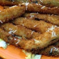 Fried Zucchinis  · Served with our creamy house ranch dressing