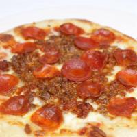 Carnivore Pizza · Free range Bolognese, nitrate free sausage & pepperoni, mozzarella, organic  pizza sauce