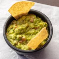Guacamole · Served with chips and salsa.