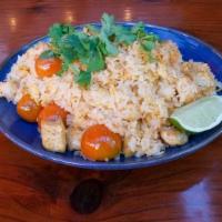 Thai Fried Rice · Egg, tomatoes, green onions, sriracha sauce, cilantro.