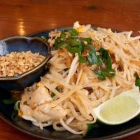 Pad Thai · Thin rice noodles, egg, bean sprouts, Asian chives, red onions, pickled radish, peanuts, lime.