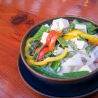 Curry Noodles · Wide rice noodles, red or green curry, Thai basil, bell peppers, green beans, snow peas.