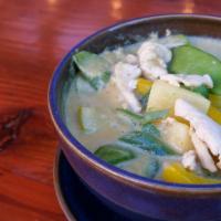 Yellow Curry · Sweet and sour yellow curry, fresh pineapple, bell peppers, green beans, snow peas.
