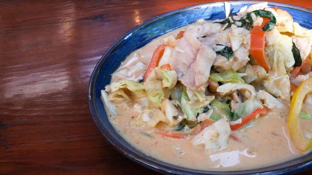 Curry Basil Red Snapper · Steamed red snapper, red curry, cabbage, bell peppers, Thai basil, cilantro.