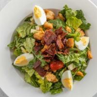 Cobb Salad · Fresh romaine lettuce, tomatoes, crispy bacon, grilled chicken breast, diced boiled egg, pro...