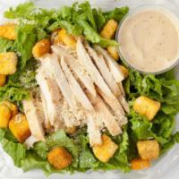 Chicken Caesar · Green leaf lettuce, Marinated chicken breast, parmesan & croutons. Served on a bed of Greenl...