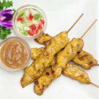 Satay Chicken · Skewered slice of marinated chicken served with peanut sauce and cucumber vinaigrette. (4pcs).