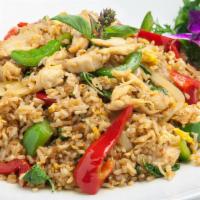Spicy Fried Rice · Steamed rice with chili, egg, red and green bell pepper, onion, garlic, and basil leaves. Cu...