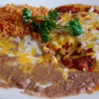 Huevos Rancheros · Crispy corn or flour tortilla topped with two eggs *any style, Spanish sauce and melted jack...