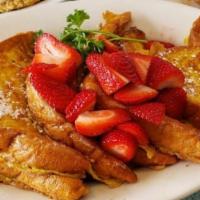 French Toast Plates · Thick cut bread dipped in our homemade batter and grilled perfectly golden-brown.
