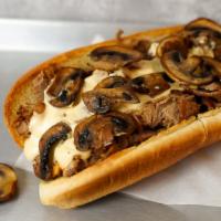 Mushroom Cheesesteak · Philly cheesesteak loaded with grilled steak, melted cheese and savory grilled mushrooms on ...