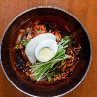 Mixed Spicy Arrowroot Noodle With Raw Skate (Hweh-Bibimnengmyun) · 회비빔 칡 냉면. Arrowroot noodle mixed in a spicy chili sauce and a medley of traditional Korean v...