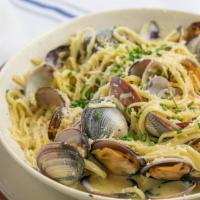Linguine And  Clams · Baja Venus Clams Steamed with White Wine, Leeks, Cream, Garlic Butter