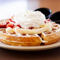 Strawberry Waffle · Waffle served with strawberries and whipped topping.