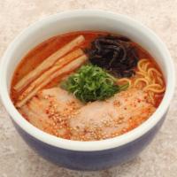 Spicy Miso Ramen · Roasted Pork, Green Onion, Mushroom, Bamboo Shoots, Sesame Seeds.