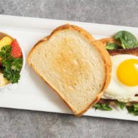Egg Blt · Applewood bacon, avocado, spinach, tomato, and one sunny up egg on white toast. Choice of si...