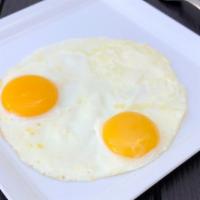 Two Eggs Any Style · Consuming raw or undercooked meats poultry, seafood, shellfish or eggs may increase your ris...