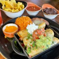 Chicken Taquitos · fried to order, served with cheese, guacamole, sour cream and pico de gallo.