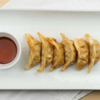 Gyoza (Pork) · 6 pieces. Deep fried pork dumpling.