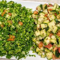 Tabouleh Salad · Parsley, cracked wheat, onions, tomato, lemon juice, and olive oil.