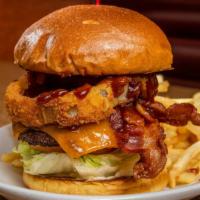 The Hickory Burger · Two slices of melted Cheddar cheese, with thick-cut bacon, crisp lettuce, tomato, RubySauce,...