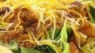 Tostada Salad Bowl · Lettuce, chicken, cheddar, rice, beans, pico de gallo, crema and ranch.