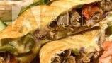 Carne Asada Quesadilla · Mozzarella, pico de gallo, sour cream and guacamole.