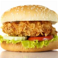 Chicken Burger · Seasoned, lean but juicy chicken burger patty topped with fresh lettuce, tomato, onion and m...
